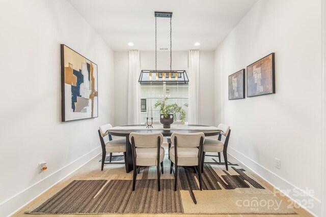 2013 S St, Charlotte, NC 28208 - dining room featuring baseboards and recessed lighting