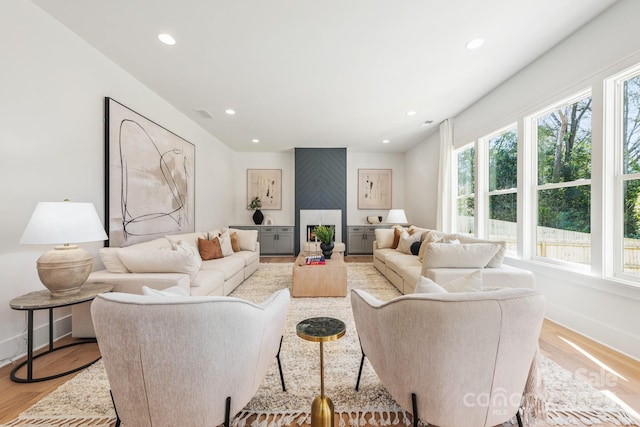 2013 S St, Charlotte, NC 28208 - living area featuring recessed lighting, light wood-style floors, and baseboards