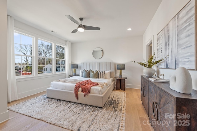 2013 S St, Charlotte, NC 28208 - bedroom with light wood-type flooring, baseboards, ceiling fan, and recessed lighting