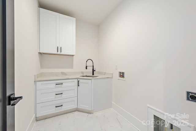 2013 S St, Charlotte, NC 28208 - washroom with electric dryer hookup, washer hookup, baseboards, and cabinet space
