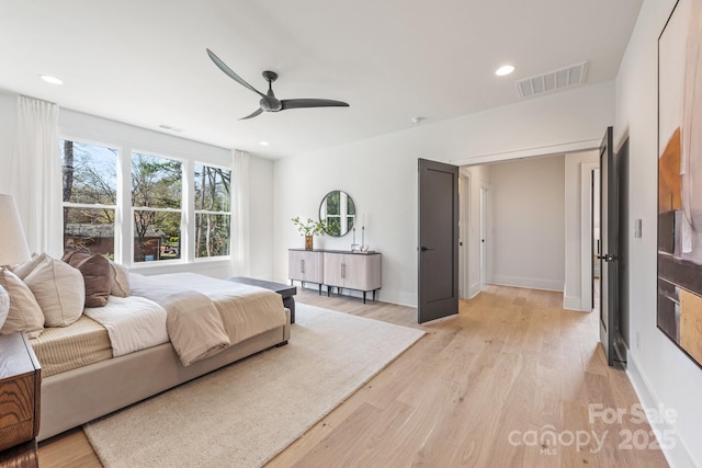2013 S St, Charlotte, NC 28208 - bedroom featuring light wood-style flooring, recessed lighting, ceiling fan, and baseboards