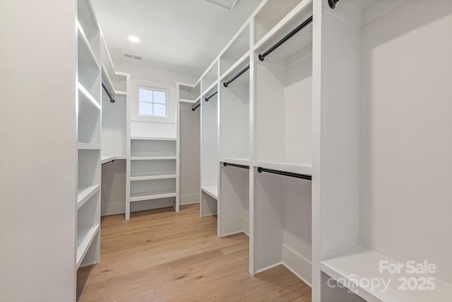 2013 S St, Charlotte, NC 28208 - spacious closet with light wood-style flooring