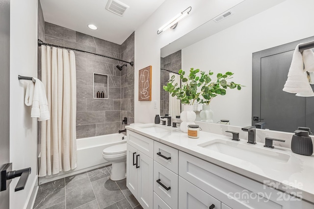 2013 S St, Charlotte, NC 28208 - full bath featuring double vanity, shower / tub combo, toilet, and recessed lighting