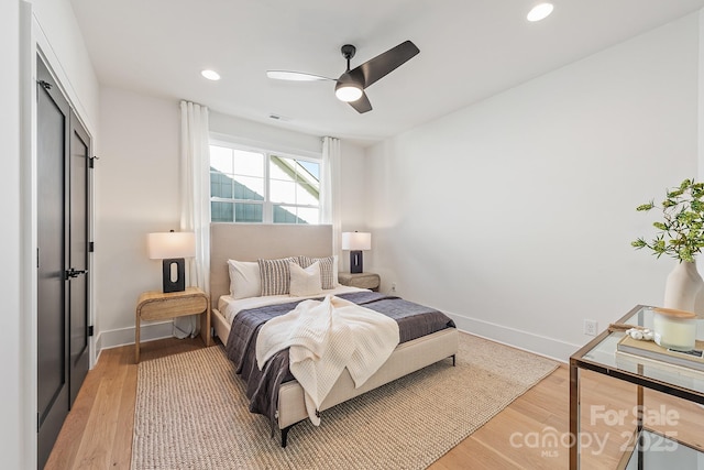 2013 S St, Charlotte, NC 28208 - bedroom featuring light wood-style floors, baseboards, recessed lighting, and ceiling fan
