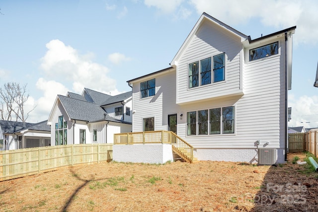 2013 S St, Charlotte, NC 28208 - back of house featuring a fenced backyard and central AC unit