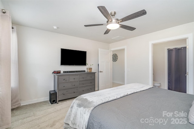 bedroom with visible vents, a ceiling fan, baseboards, and light carpet