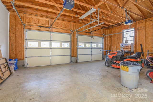 garage featuring a garage door opener