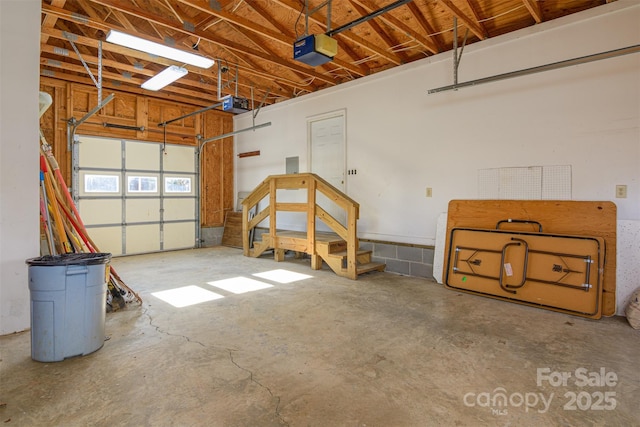 garage featuring a garage door opener