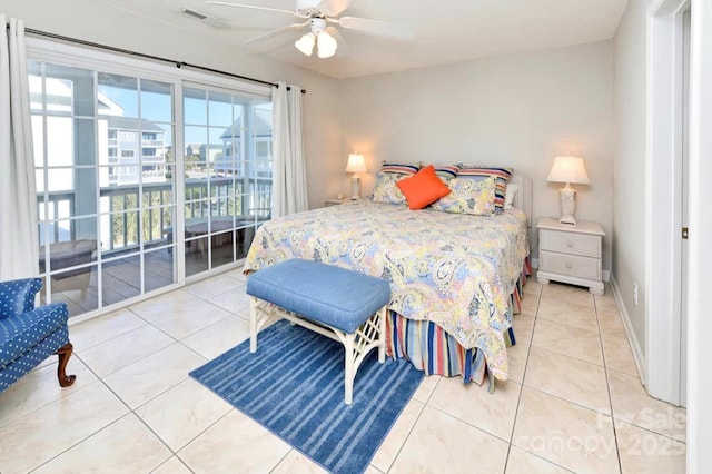 bedroom featuring tile patterned floors, baseboards, a ceiling fan, and access to outside