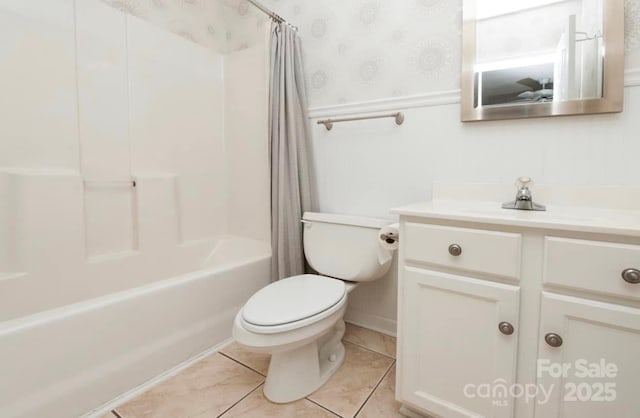 full bath featuring vanity, wallpapered walls, tile patterned flooring, toilet, and shower / tub combo with curtain