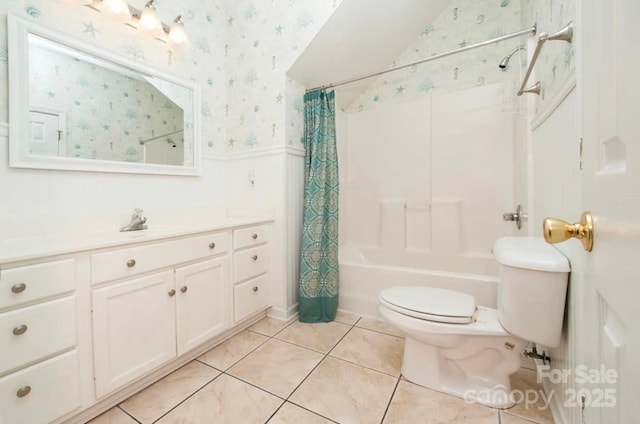 bathroom featuring toilet, shower / bath combo, wallpapered walls, wainscoting, and tile patterned flooring