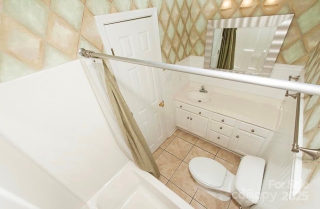 full bath featuring vanity, tile patterned floors, toilet, and a shower with shower curtain