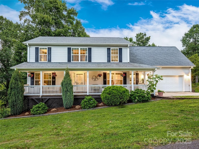 view of front of property featuring covered porch, a front lawn, a garage, and roof with shingles