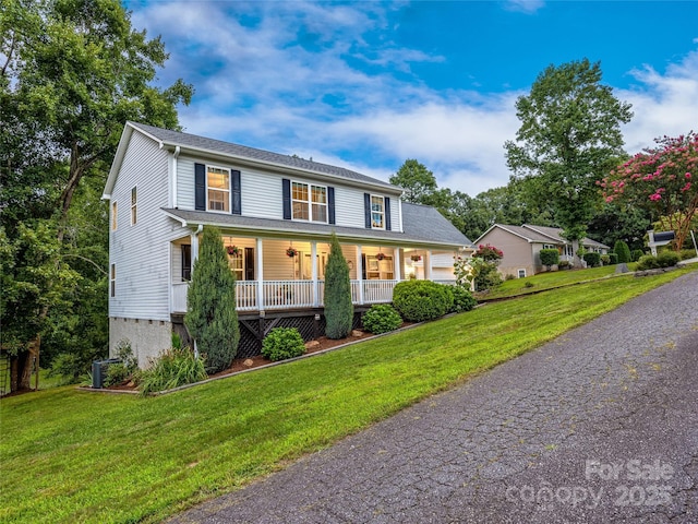 view of front of home featuring a porch and a front yard