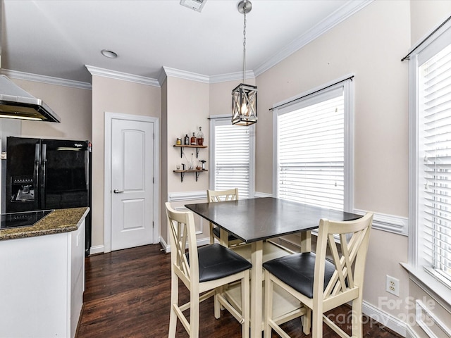 dining area with a chandelier, visible vents, dark wood-style floors, and ornamental molding