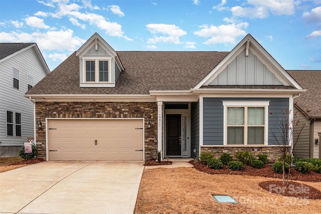 19011 Dry Narrows Way, Charlotte, NC 28278 - craftsman-style home with concrete driveway, an attached garage, stone siding, and roof with shingles