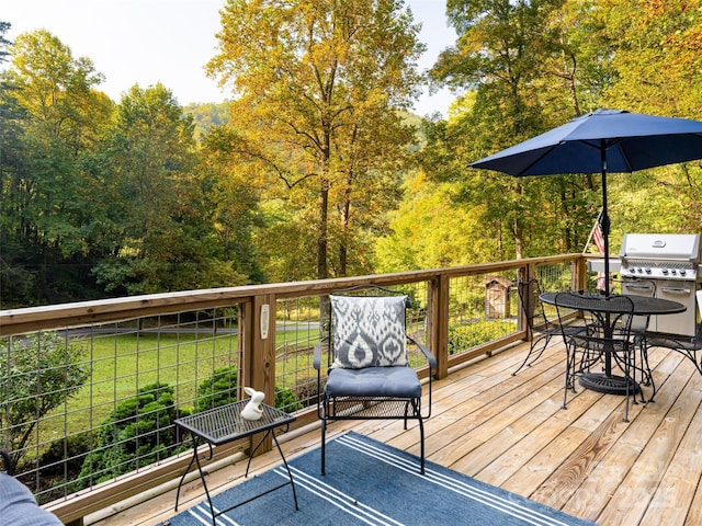 wooden terrace with grilling area