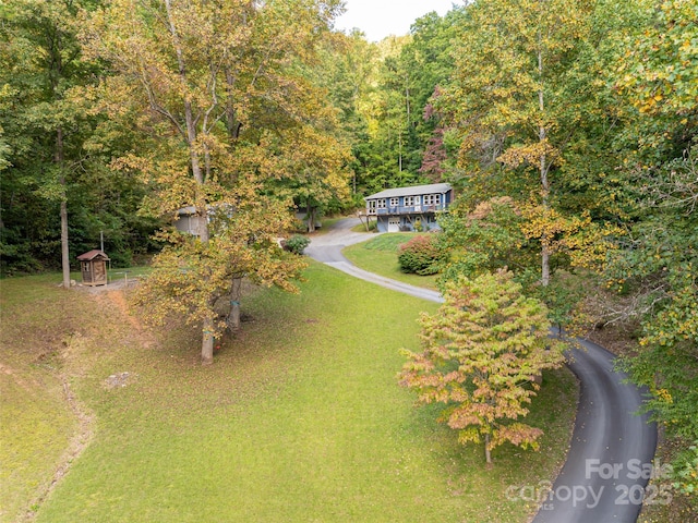 bird's eye view featuring a view of trees