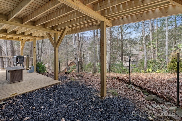 view of yard with a wooden deck