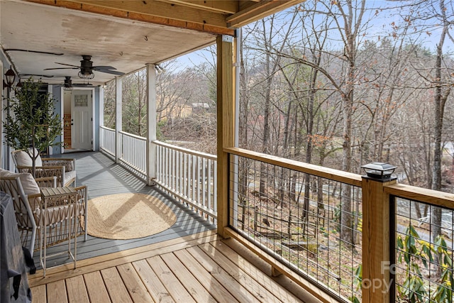 wooden deck with ceiling fan