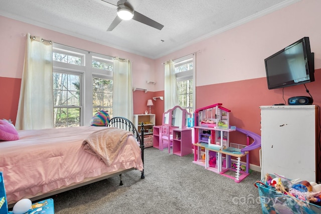 carpeted bedroom featuring crown molding, a ceiling fan, and a textured ceiling