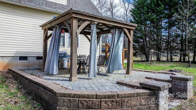 view of patio featuring a gazebo