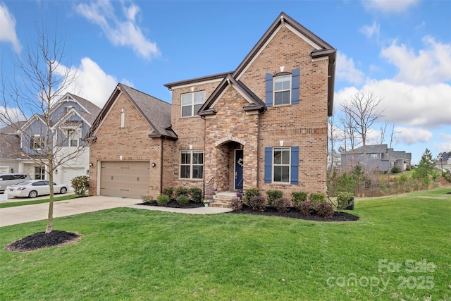 traditional-style house with brick siding, an attached garage, concrete driveway, and a front yard