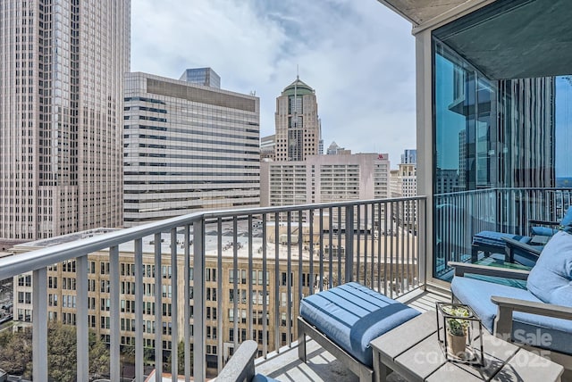 balcony featuring a view of city