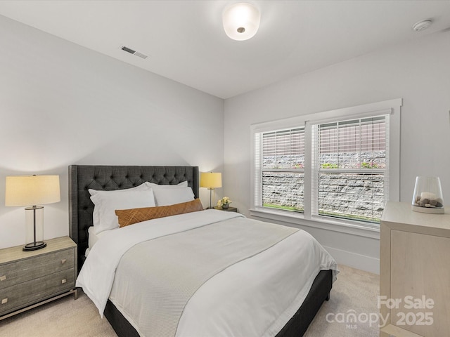 1409 Kenilworth Ave, Charlotte, NC 28203 - bedroom featuring light colored carpet and baseboards