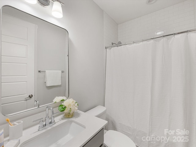 1409 Kenilworth Ave, Charlotte, NC 28203 - full bath with vanity and toilet