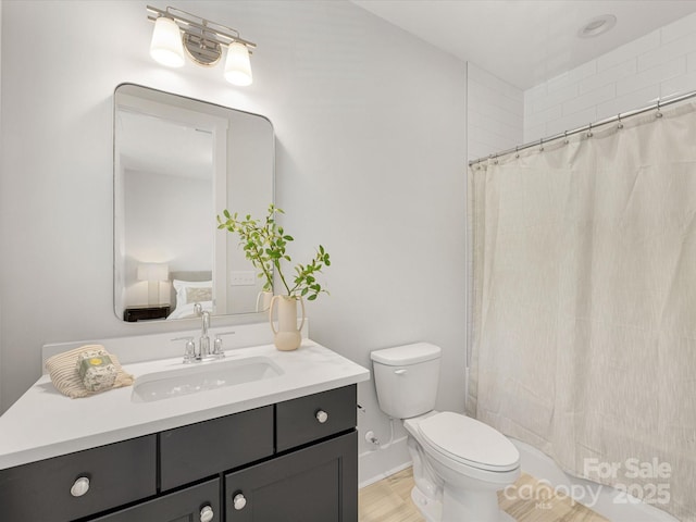 1409 Kenilworth Ave, Charlotte, NC 28203 - bathroom with vanity and shower / tub combo with curtain