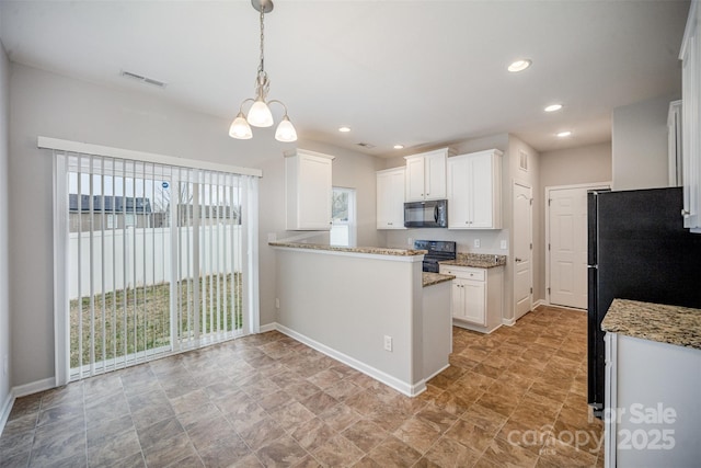 kitchen with visible vents, a healthy amount of sunlight, white cabinetry, and black appliances