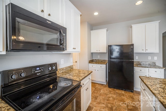 kitchen featuring black appliances, white cabinets, recessed lighting, and light stone countertops