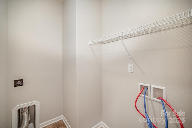 laundry room with hookup for a washing machine, baseboards, hookup for an electric dryer, and laundry area