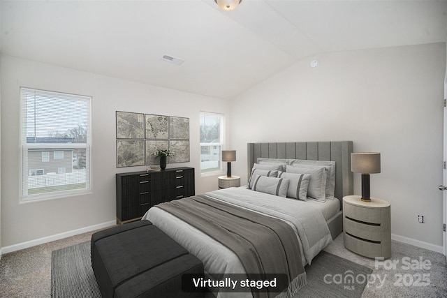 bedroom with baseboards, visible vents, lofted ceiling, and light carpet