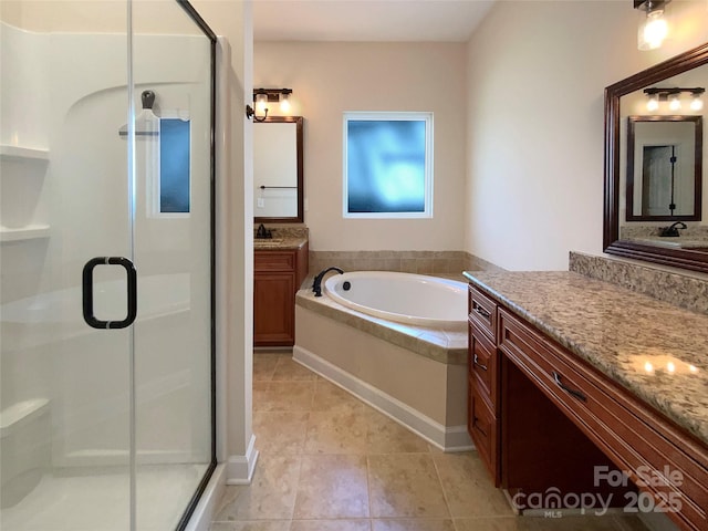 full bathroom featuring a bath, tile patterned flooring, a shower stall, and a sink