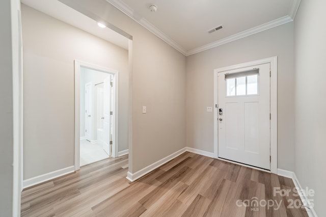 1819 Lotus Ln, Denver, NC 28037 - foyer entrance featuring light wood-type flooring, ornamental molding, and baseboards