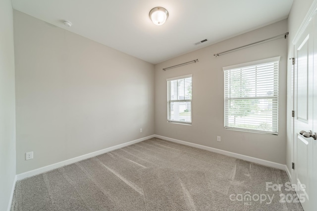 1819 Lotus Ln, Denver, NC 28037 - carpeted spare room with healthy amount of natural light and baseboards