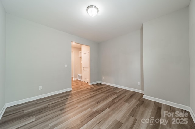 1819 Lotus Ln, Denver, NC 28037 - empty room with wood finished floors and baseboards
