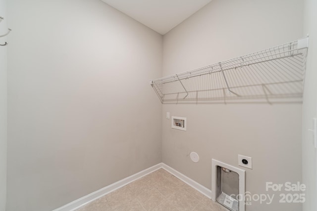 1819 Lotus Ln, Denver, NC 28037 - laundry area with hookup for an electric dryer, hookup for a washing machine, baseboards, and light tile patterned flooring