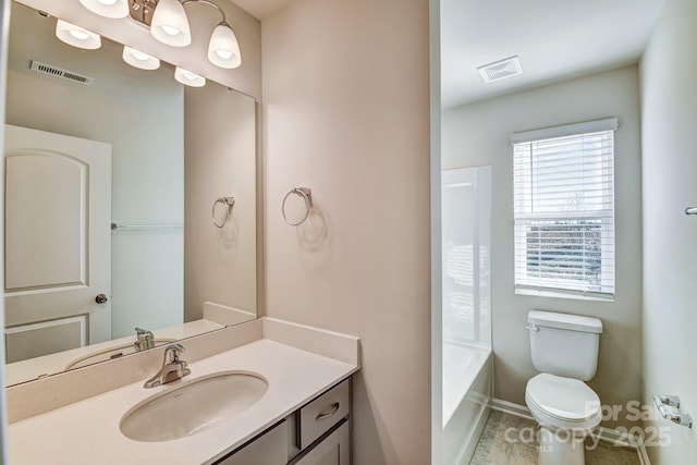 full bath featuring vanity, toilet, baseboards, and visible vents