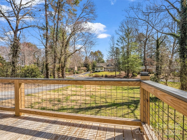 deck featuring a lawn