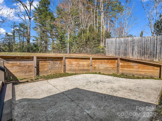 view of patio with fence