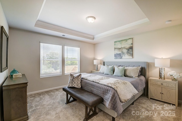 bedroom featuring a tray ceiling, baseboards, light colored carpet, and visible vents