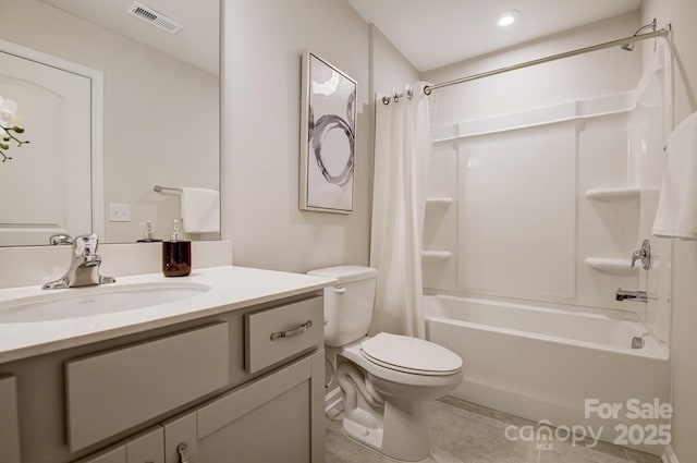 full bathroom with vanity, visible vents, shower / bath combination with curtain, tile patterned floors, and toilet