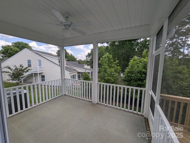 exterior space with a ceiling fan