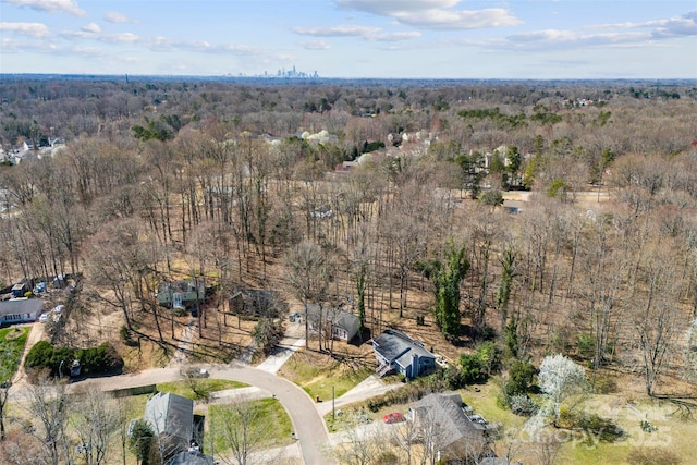 aerial view with a wooded view