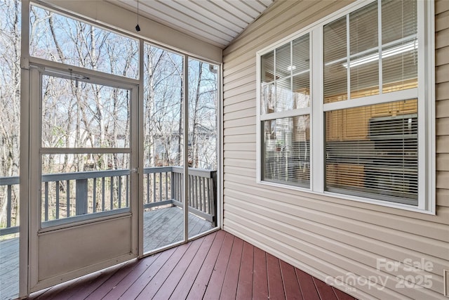 unfurnished sunroom with a healthy amount of sunlight