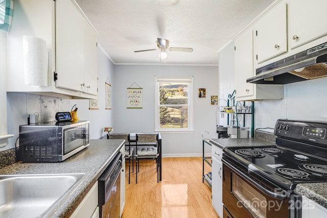 kitchen featuring under cabinet range hood, black appliances, white cabinets, and a ceiling fan