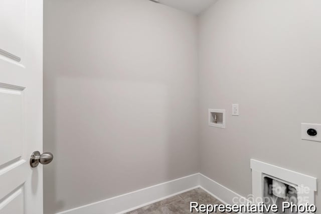 laundry area with light tile patterned floors, baseboards, hookup for an electric dryer, laundry area, and washer hookup